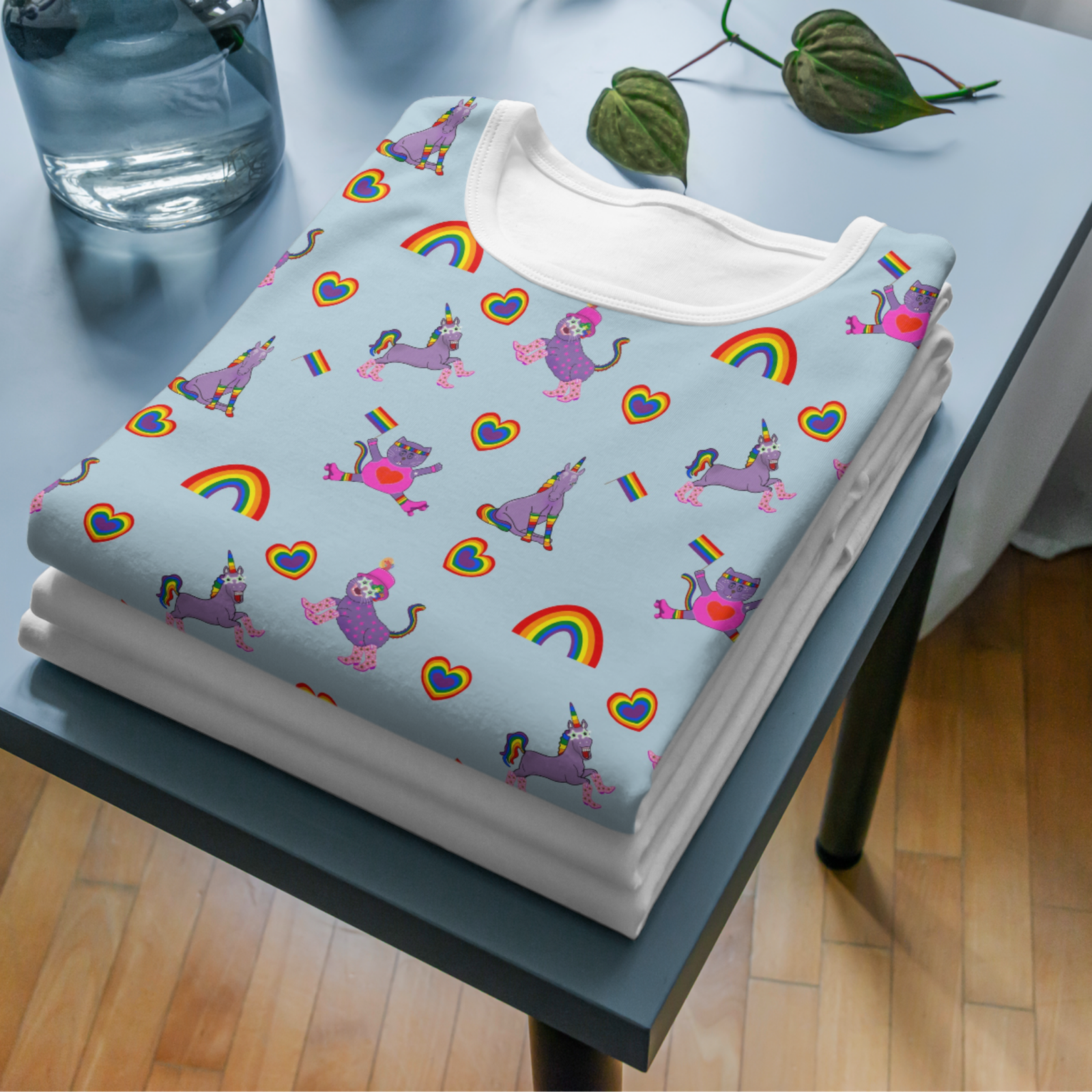 image of playful cats and unicorns celebrating pride on a t shirt by moggymade